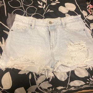 Light blue ripped high rise shorts